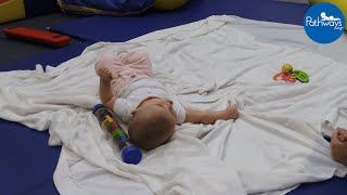 Baby Rolling Over During Tummy Time  A Parenting Guide [upl. by Phio]