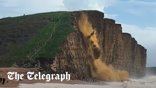 Dorset cliff collapses launching 400tonnes of rockfall into ocean [upl. by Rehpatsirhc]