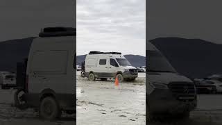 Burning Man 2023  Vehicles push through mud at the soggy festival in Nevada desert [upl. by Dlanar]