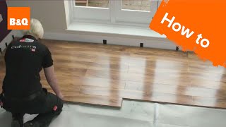 How to lay flooring part 3 laying locking laminate [upl. by Atival]