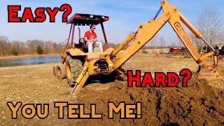 How to Operate a Backhoe [upl. by Anaes]