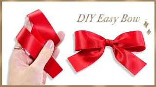 How to tie the perfect bow  DIY ribbon bow  How to make simple satin bow  Gift Wrapping Land [upl. by Danette185]