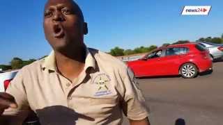 WATCH Gauteng cop shoves motorist during roadside altercation [upl. by Swanhildas]