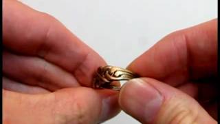 How to assemble a Turkish Promise Ring 4 band puzzle ring [upl. by Hoenack]