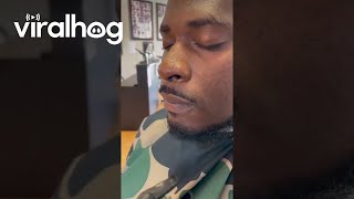 Barber Pranks Client By Softly Brushing Lips  ViralHog [upl. by Enitsrik]