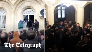 AntiRussia protesters storm parliament in Georgian breakaway region of Abkhazian [upl. by Irvin]