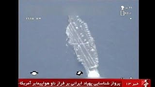 Iranian drone takes quotprecisequot photos as it flies over US aircraft carrier [upl. by Atterual970]