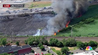 Crews battling brush fire in Secaucus near train tracks NJ turnpike [upl. by Winfield]