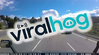 TractorTrailer Sideswiped at Highway Speed  ViralHog [upl. by Etteneg731]