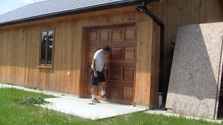 The Woodpecker Ep 93  Building the new shop part 21  Installing the garage door [upl. by Voletta]