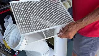 How to clean the Filter on a Toshiba 14000 BTU Air Conditioner [upl. by Aloysius]