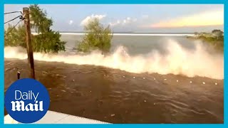 Tonga tsunami Powerful moment tidal wave hits the Pacific island [upl. by Ainerbas]