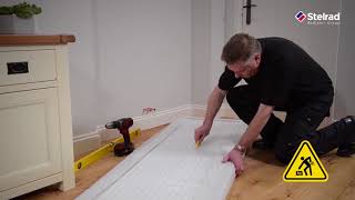 How to install a Stelrad Vertical Radiator [upl. by Meluhs]