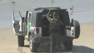 Watch illegal migrants jump over Trumps Border Wall [upl. by Allekim]