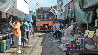 Maeklong Railway Market Thailand [upl. by Nerac421]