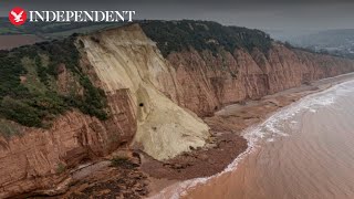 Cottage left teetering on the brink of 400ft drop after Jurassic Coast cliff fall [upl. by Notlrak]