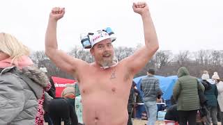 Watch these brave souls make the jump into Lake Michigan for 2024 Polar Bear Plunge [upl. by Mackenzie836]