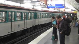 France Paris Metro train of rubber tyred MP73 stock at Denfert Rocherau station Line 6  Ligne 6 [upl. by Krall639]