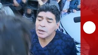 Video Diego Maradona slaps reporter for winking at exwife [upl. by Michel365]