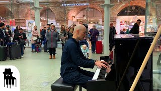 Disguised concert pianist stuns unsuspecting travelers [upl. by Ahslek]