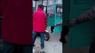 The process of installing a rainproof canopy on a tricycle [upl. by Norvol]