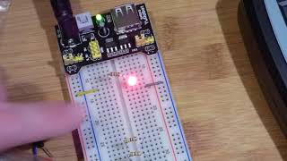 Step by step electronics circuit builds 1 lighting a resistor protected LED on a breadboard [upl. by Emmalynn41]