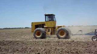 475C Rome tractor and DMI field cultivator 2009 [upl. by Eerized425]