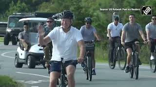 US President Joe Biden takes bike ride near his Delaware vacation home [upl. by Eilujna]