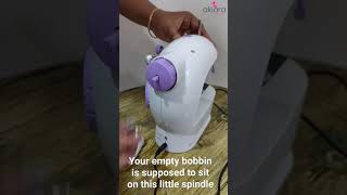 How to wind a bobbin in Mini Sewing Machine [upl. by Eey]