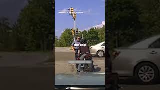 Biker Pushes Cop Into Oncoming Traffic [upl. by Martino542]