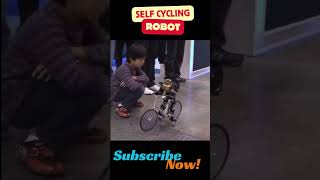 Meet the Worlds First BicycleRiding Robot [upl. by Lahtnero]