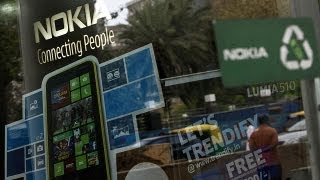 Nokia sells fewer phones but losses trimmed  economy [upl. by Nnaed]