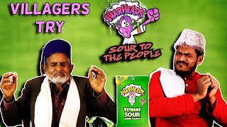 Villagers Try Warheads Extreme Sour Candy  Tribal People Try Warheads Extreme Sour Candy [upl. by Isiad]