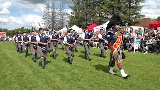 Drum Major Dyer leads Aberlour Pipe Band playing on the march during 2023 Dufftown Highland Games [upl. by Llennoc]