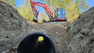 Pond dam pipe replacement with the Kubota KX080 4 [upl. by Odraccir]