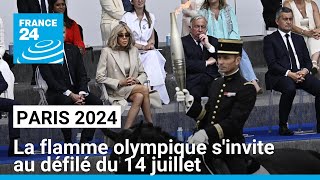 Paris 2024  la flamme olympique sinvite aux festivités du 14 juillet dans la capitale [upl. by Burbank386]