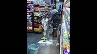 Elderly woman accidentally breaks milk bottle in store shorts [upl. by Byrn]