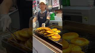 Hotteok pancakes at the Korean food market travel hotteok seoul koreanfood [upl. by Altman379]