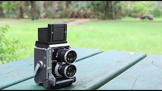 How to load a 120 film Medium Format Camera Mamiya C3 [upl. by Annyl]