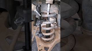 Mechanic Tip Compressing Coil Springs [upl. by Acinej]