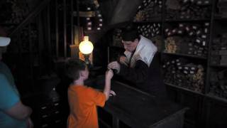 A wand chooses a boy inside Ollivanders Wand Shop in The Wizarding World of Harry Potter [upl. by Ani]