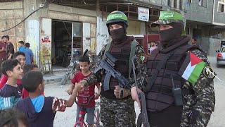 Members of Hamas armed wing parade in Gaza City [upl. by Farrow]