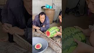 The process of cutting watermelon with steel knife [upl. by Estas]