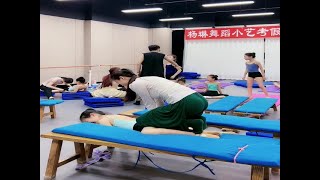 Students doing dance flexibility training [upl. by Cheadle692]