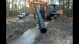 Installing culvert pipes [upl. by Darnoc]