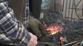 Starting and maintaining a coal forge fire  basic blacksmithing [upl. by Esilanna799]