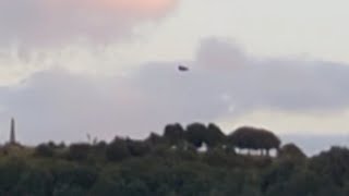 Strange Black Triangular Shaped UFO Sighted Over Werneth Low Hill In Manchester England UK [upl. by Enorahs]