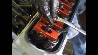 Setting Hydraulic lifters with roller rockers on a 400 Pontiac [upl. by Ytirehc]