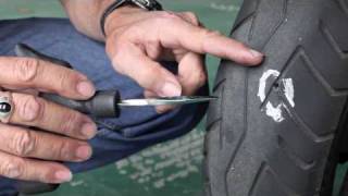 Motorcycle tyre repair  How to plug a bike tire [upl. by Lunetta]