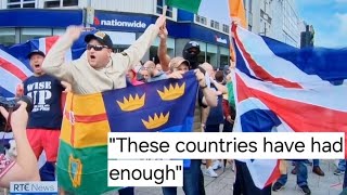 Union flag and tricolour are flown together at protest in Belfast [upl. by Peggi]